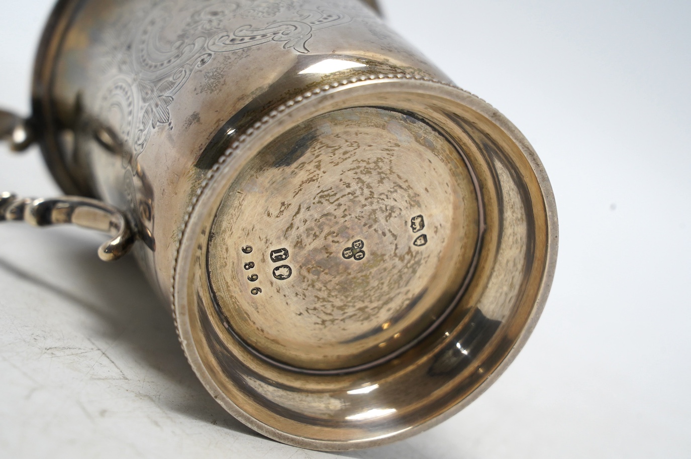 A Victorian engraved silver christening mug, by Edward Charles Brown, London, 1872, 11cm, 5.4oz. Condition - fair to good